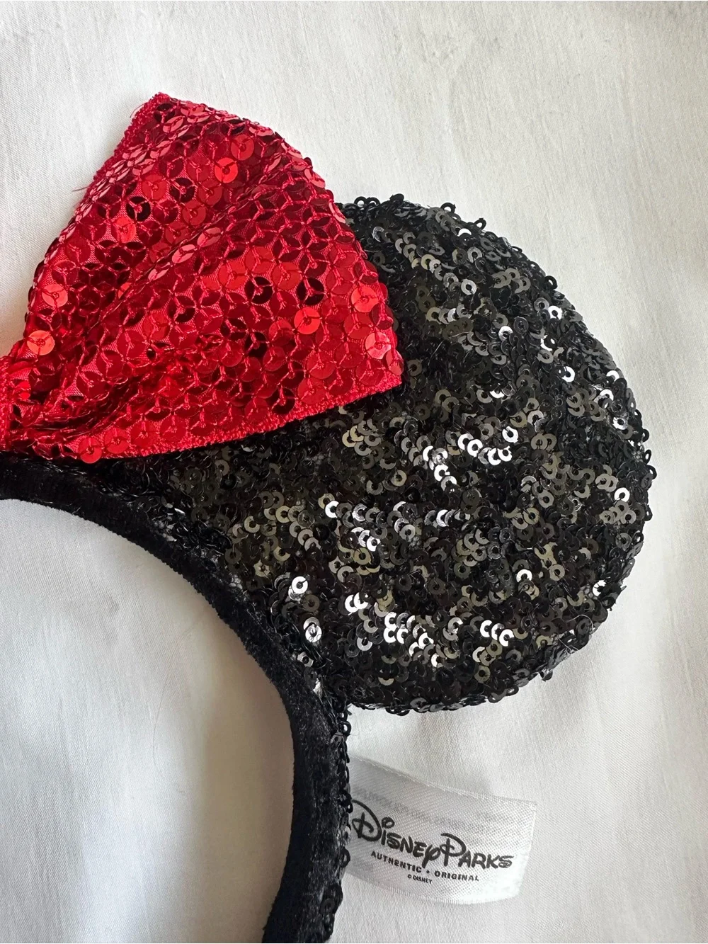 Official Disney Parks Sequin Minnie Ears Headband with Red Bow- Black & Red